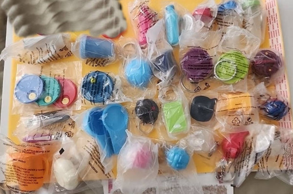 TUPPERWARE LOT/ 30 TINY TREASURES 20 KEYCHAINS 8 MAGNETS 2 GADGETS