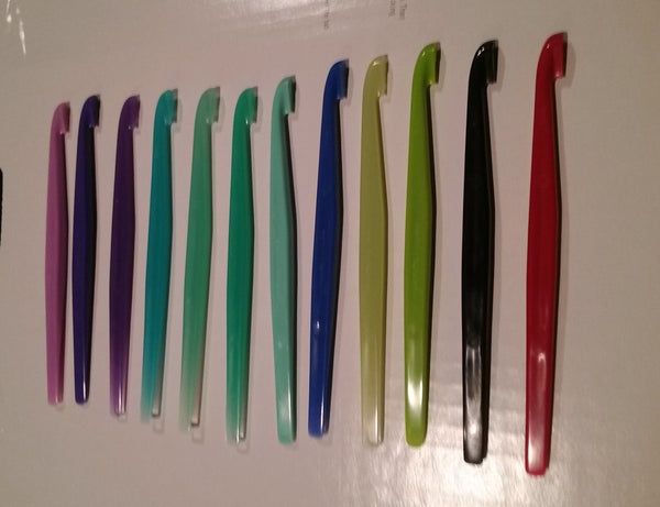 Tupperware 2 VARIOUS COLORED MULTI-PURPOSE FRUIT CITRUS PEELERS - 2 DIFFERENT COLORS