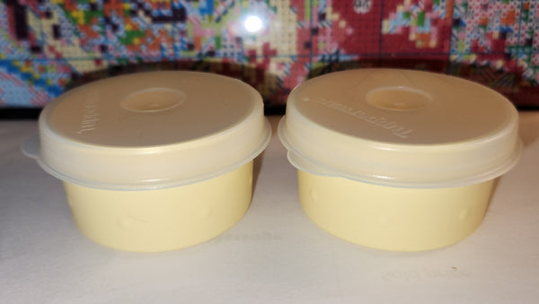 TUPPERWARE 2 SMIDGET PILL KEEPERS 1-OZ SMIDGETS PALE YELLOW w/ SHEER SEALS - Plastic Glass and Wax ~ PGW