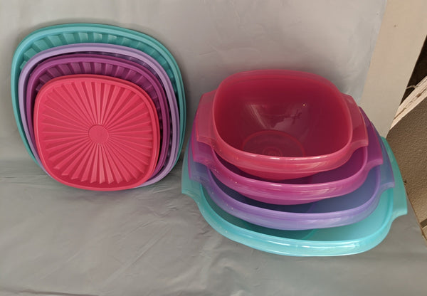TUPPERWARE SERVALIER SET OF FOUR - 4 BLUE COLORED BOWLS w/ ONE-TOUCH ACCORDION SEALS