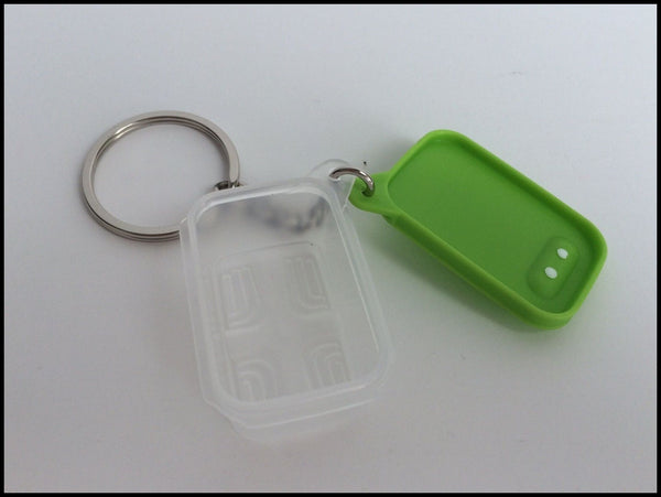 TUPPERWARE 5 Mini BLOSSOM ROUND LIME GREEN WHITE SEAL KEYCHAIN KEEPERS NEW