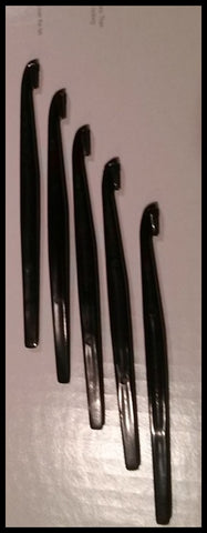 Tupperware 5 COLORED MULTI-PURPOSE ORANGE GRAPEFRUIT CITRUS PEELERS - JET BLACK - Plastic Glass and Wax