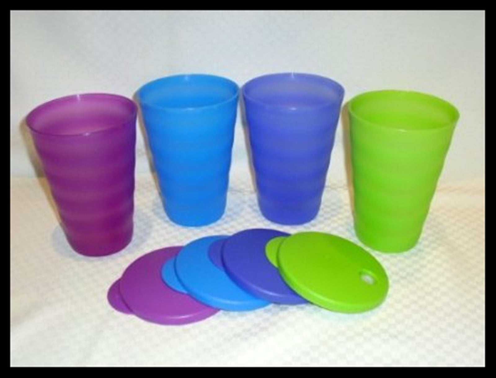 Tupperware Set of 4 Tumblers 16 Ounce Cups Blue, Yellow, Pink and Green